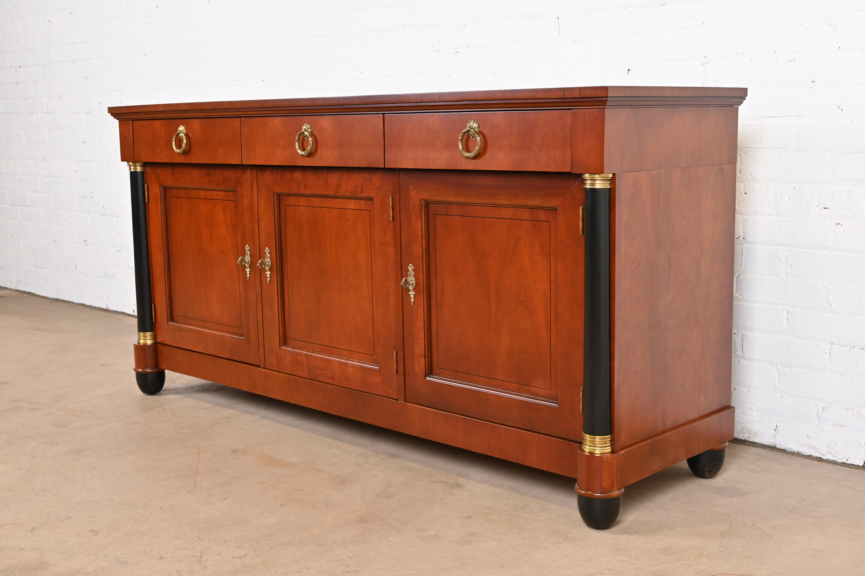 1980s Baker Furniture Neoclassical Cherry Wood and Parcel Ebonized Credenza