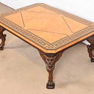 Baker Furniture Neoclassical Cocktail Table With Burl Wood Greek Key Top and Carved Mahogany Lion Legs