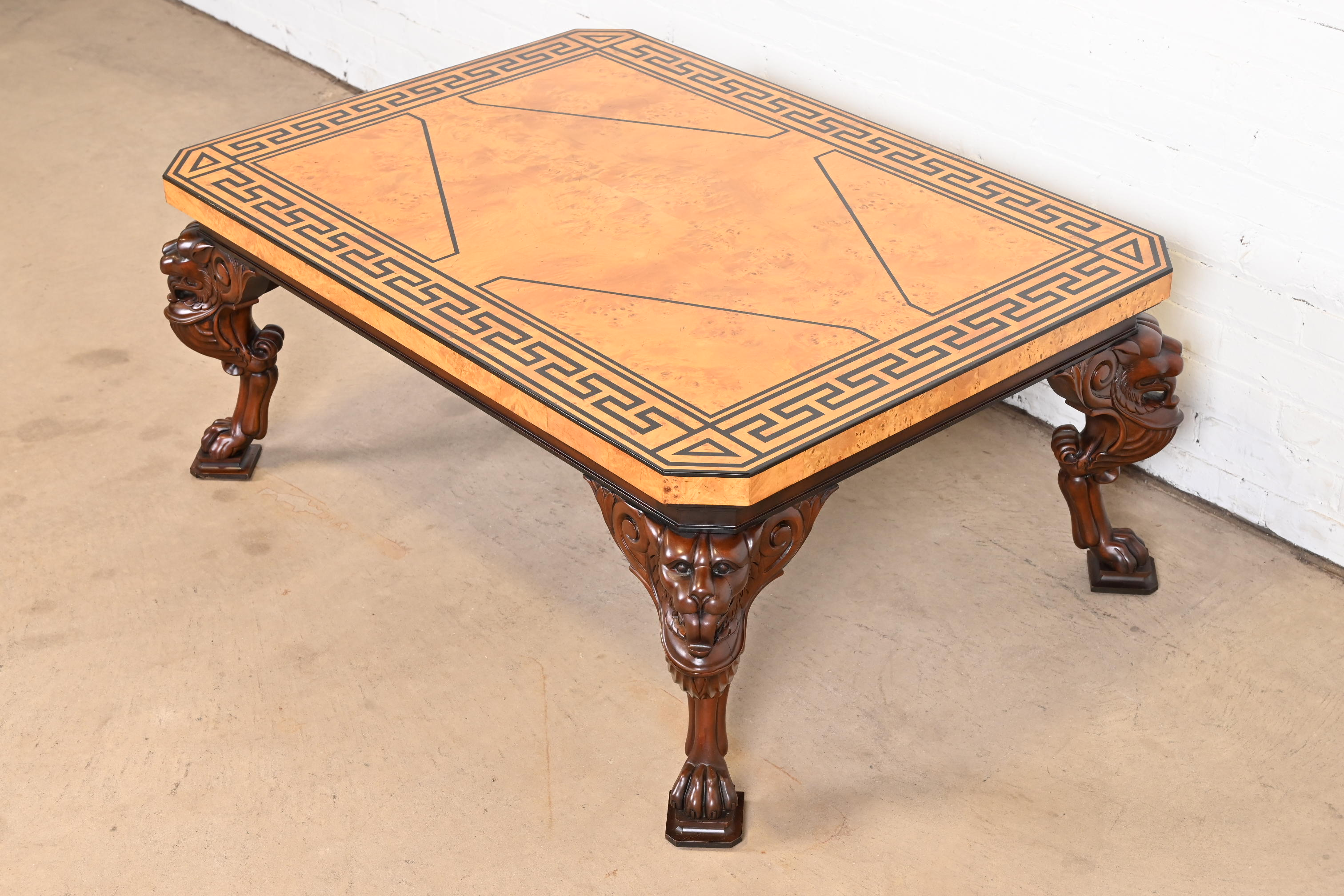 Baker Furniture Neoclassical Cocktail Table With Burl Wood Greek Key Top and Carved Mahogany Lion Legs