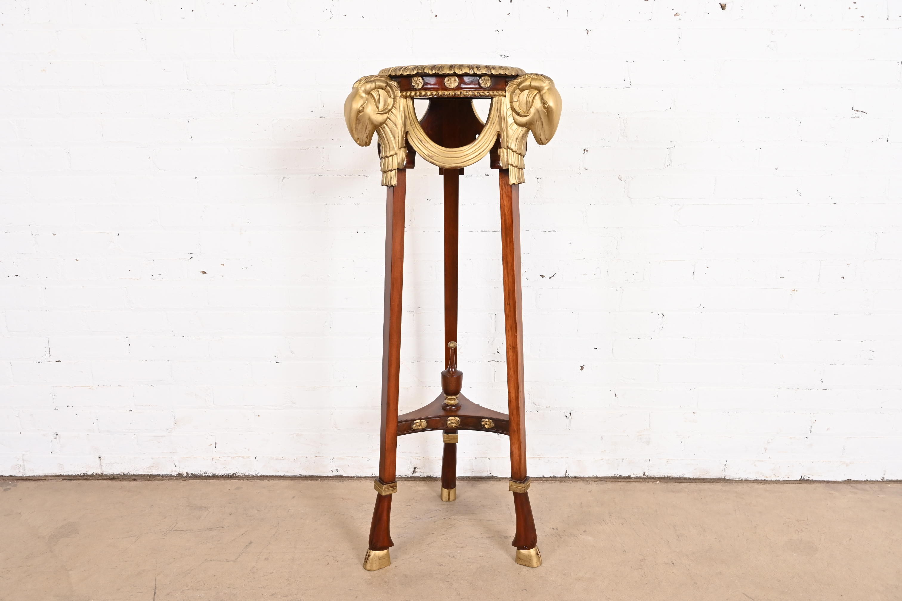 John Widdicomb Neoclassical Mahogany Guéridon Pedestal Table or Plant Stand With Gold Gilt Ram Heads and Hooved Feet