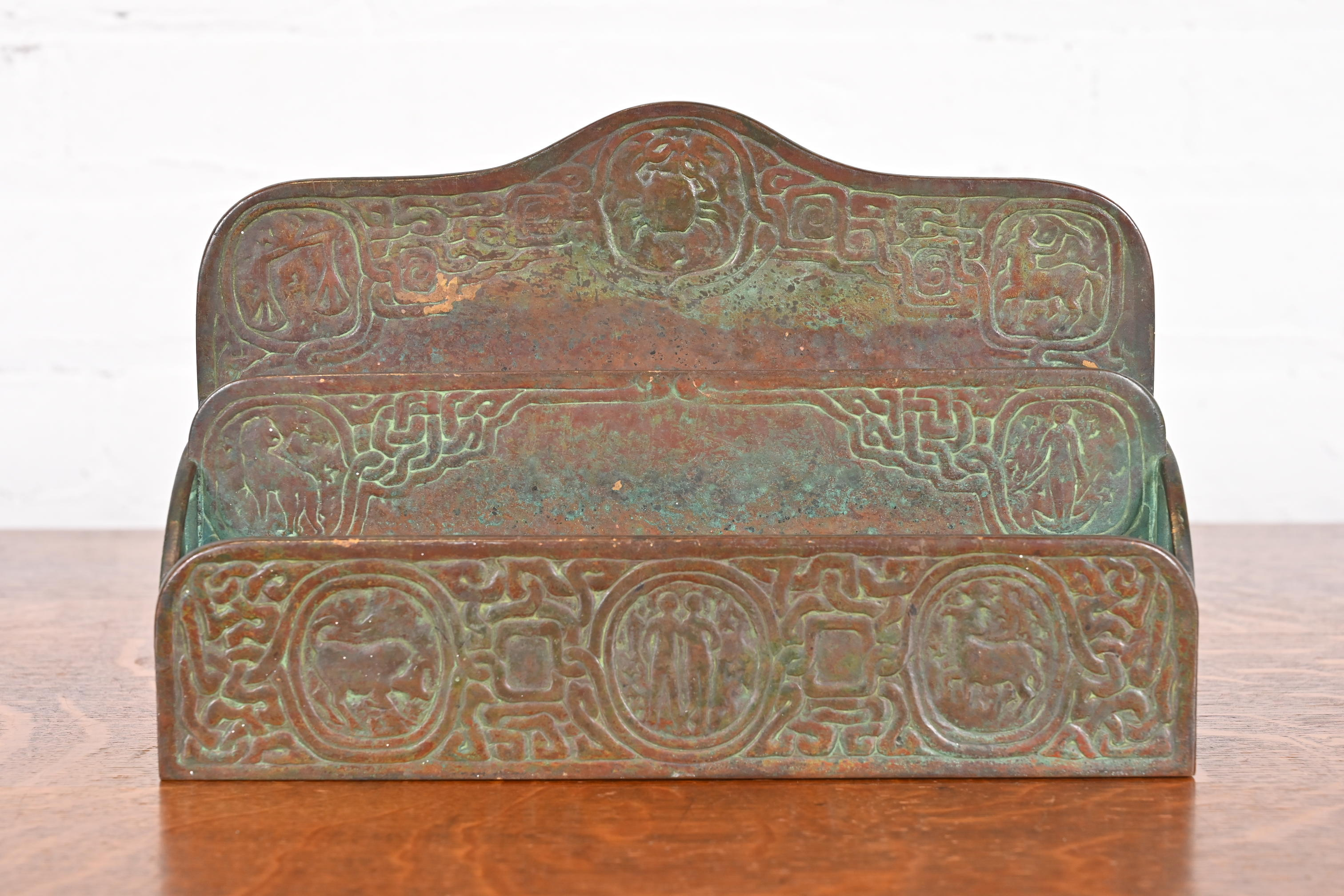 Tiffany Studios New York Zodiac Patinated Bronze Letter Rack, Circa 1910