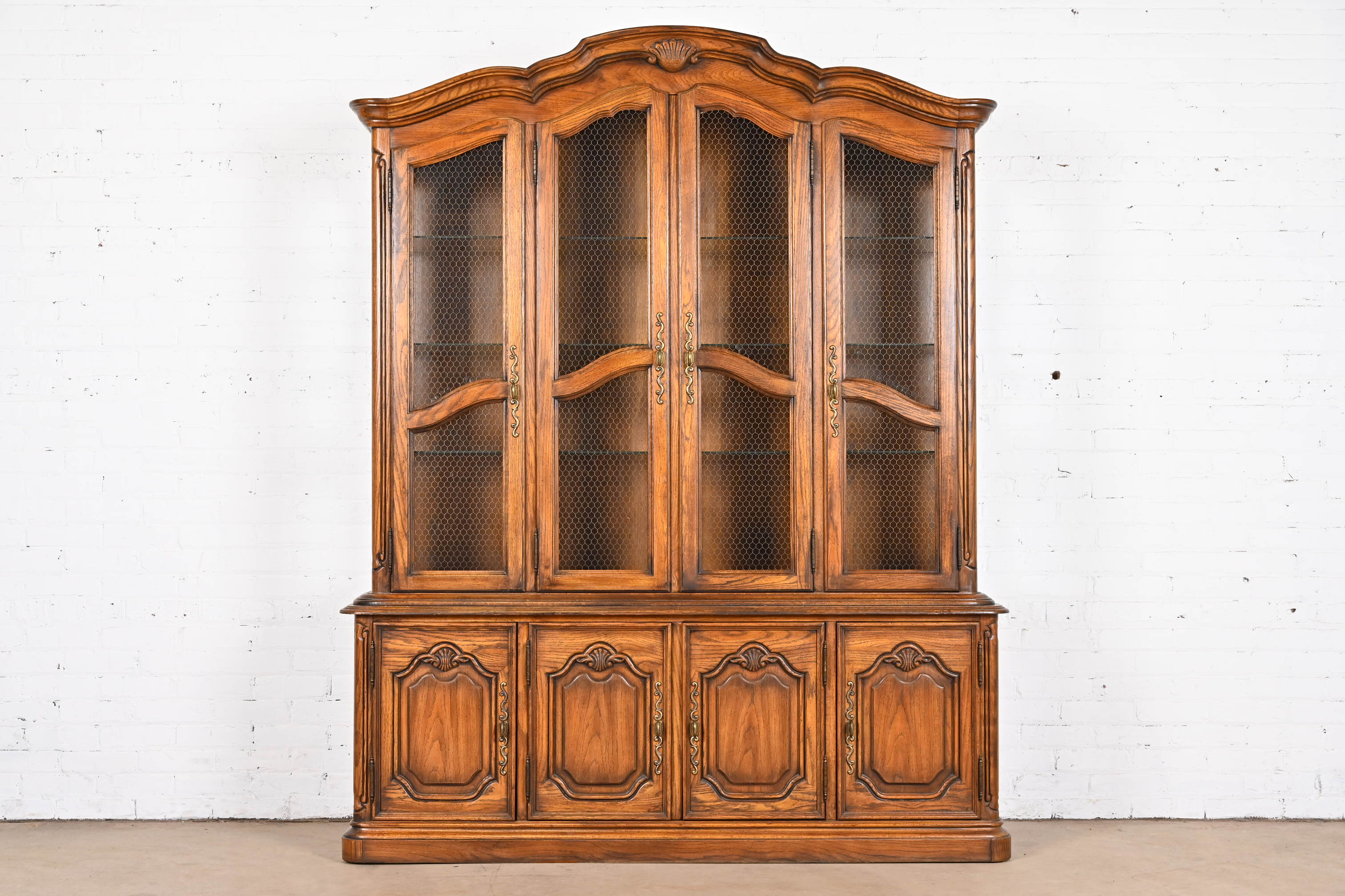 Drexel Heritage French Provincial Carved Oak Lighted Breakfront Bookcase Cabinet, 1970s