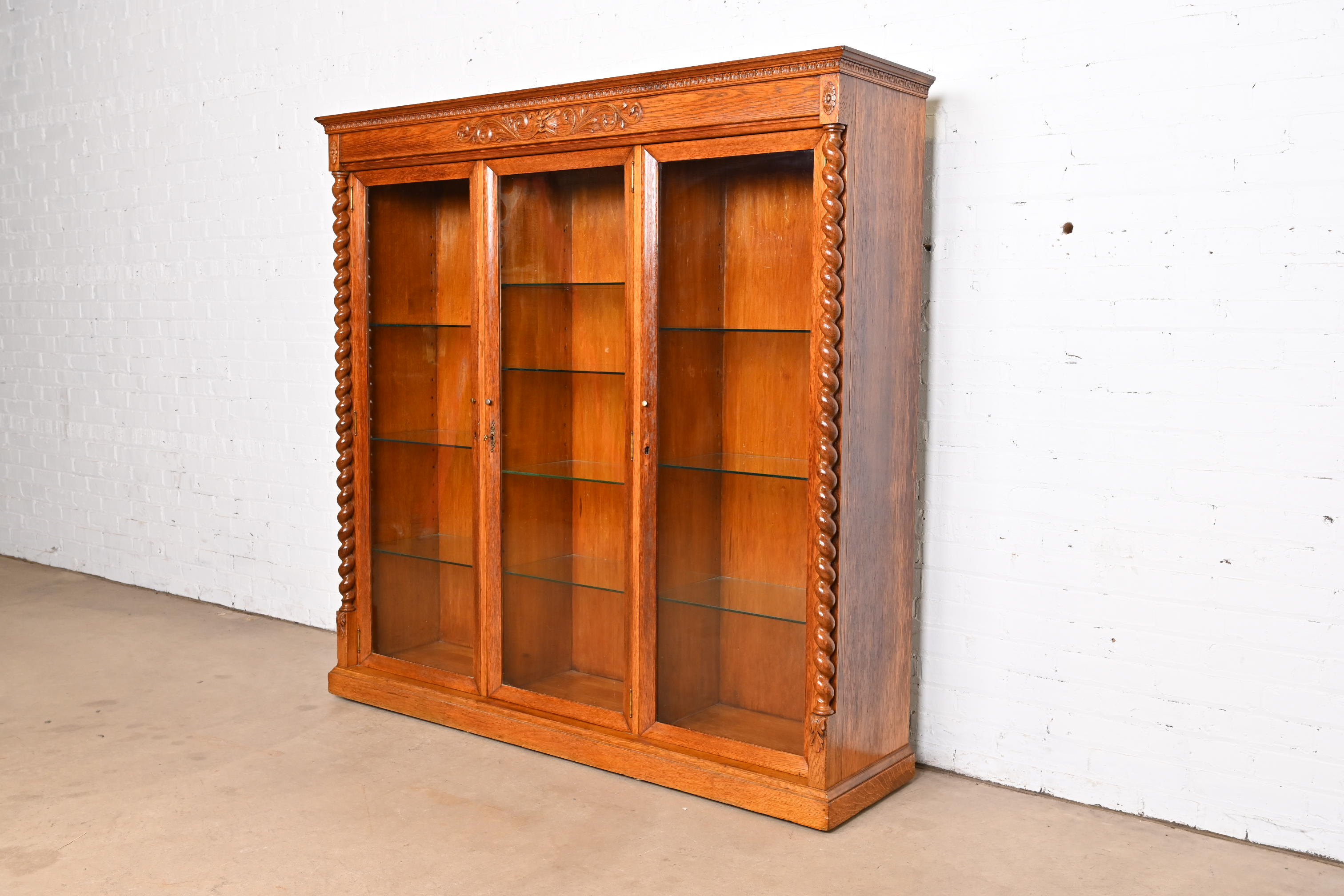 R. J. Horner Style Antique Victorian Carved Oak Lighted Triple Bookcase or Display Cabinet, Circa 1890s - Image 3