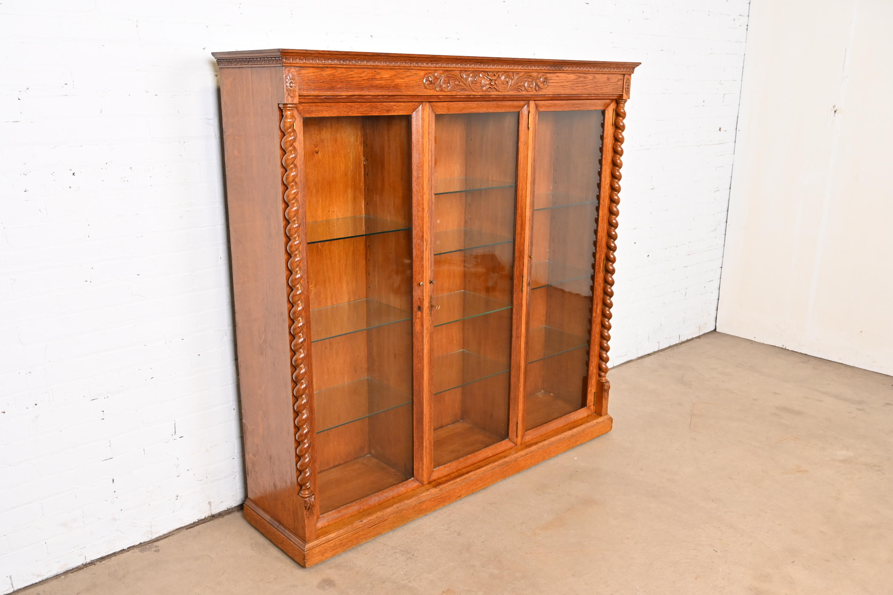 R. J. Horner Style Antique Victorian Carved Oak Lighted Triple Bookcase or Display Cabinet, Circa 1890s - Image 4