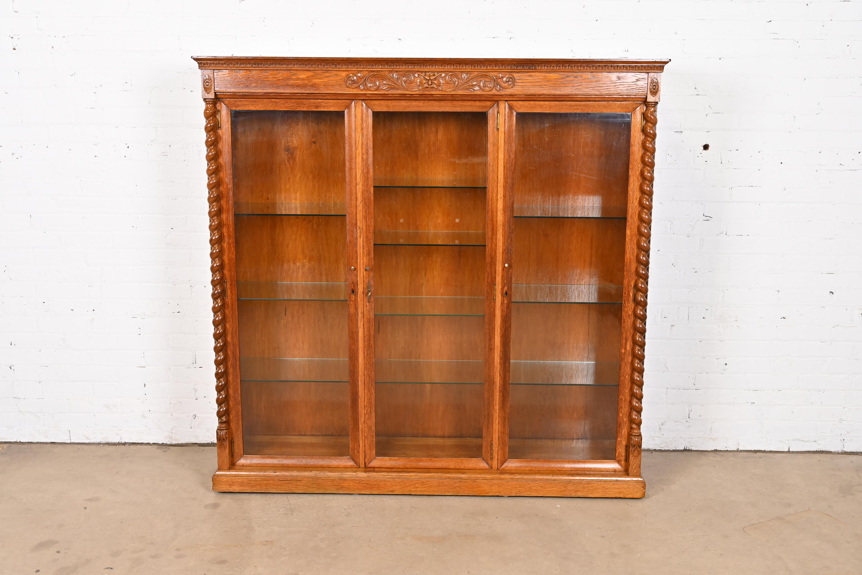 R. J. Horner Style Antique Victorian Carved Oak Lighted Triple Bookcase or Display Cabinet, Circa 1890s - Image 2