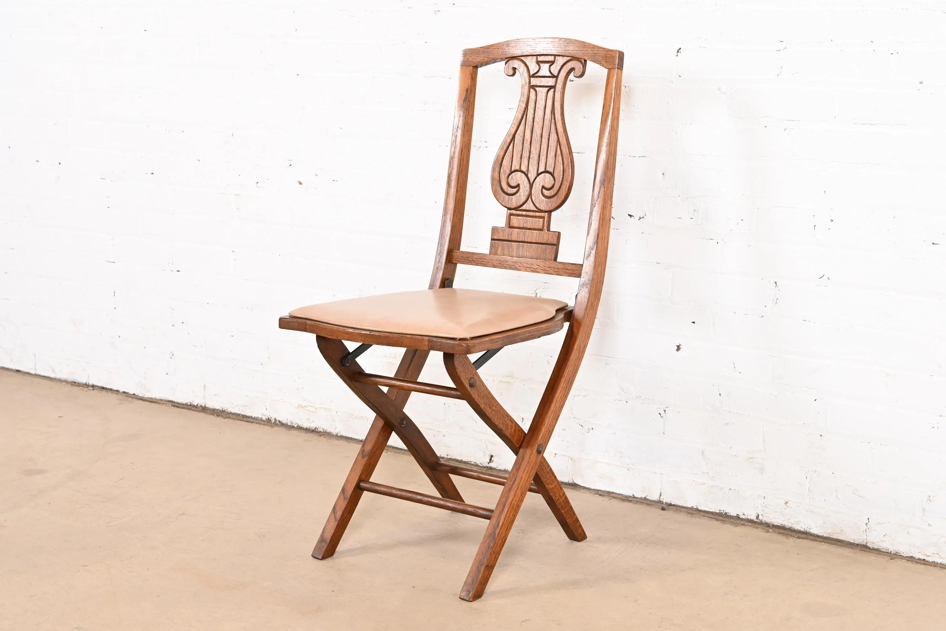 Antique Arts & Crafts Carved Oak Lyre Back Folding Chair by Phoenix Chair Co., Circa 1920s