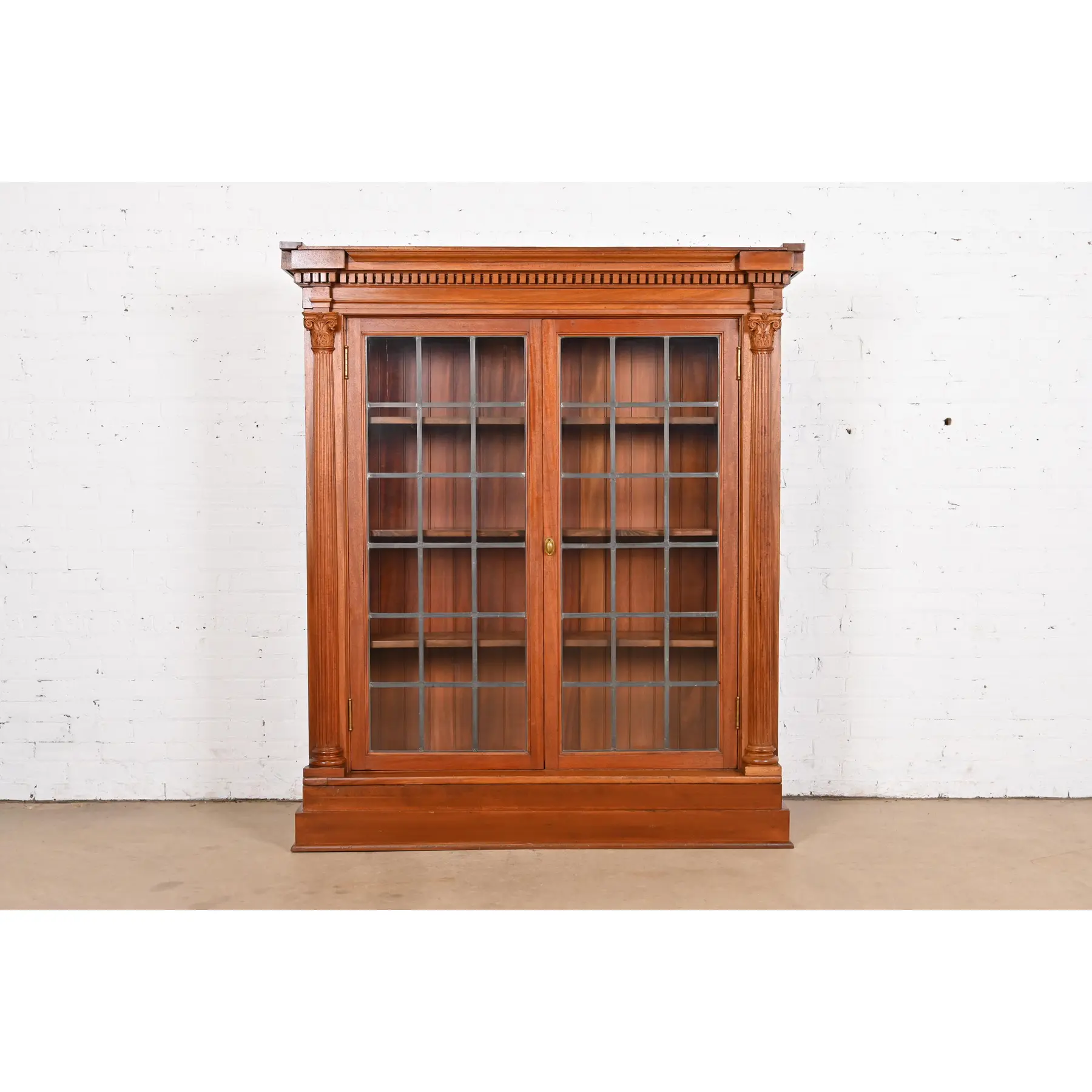 R. J. Horner Style Antique American Empire Carved Mahogany Bookcase Cabinet, Circa 1890s