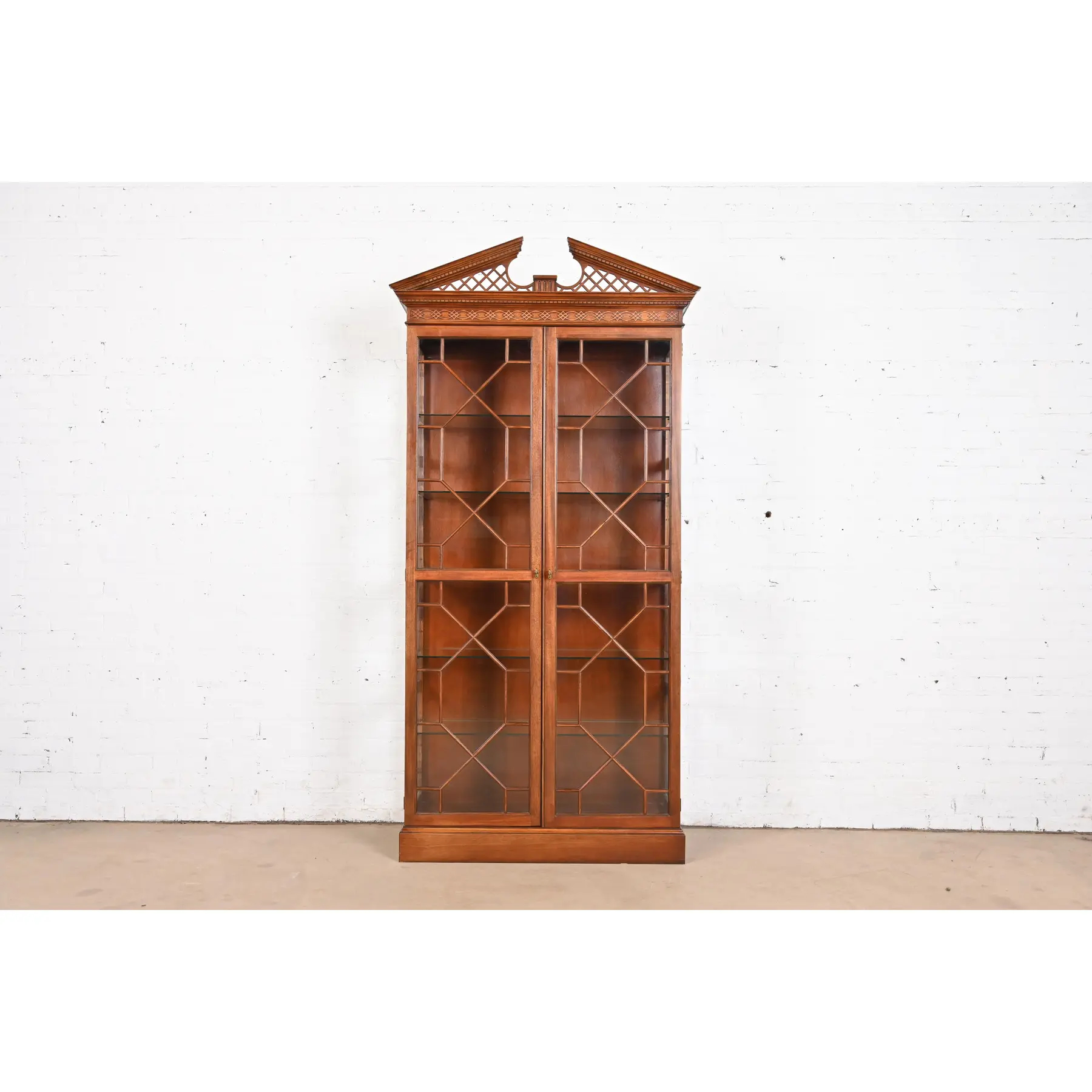 Baker Furniture Georgian Carved Mahogany Lighted Breakfront Bookcase or Display Cabinet