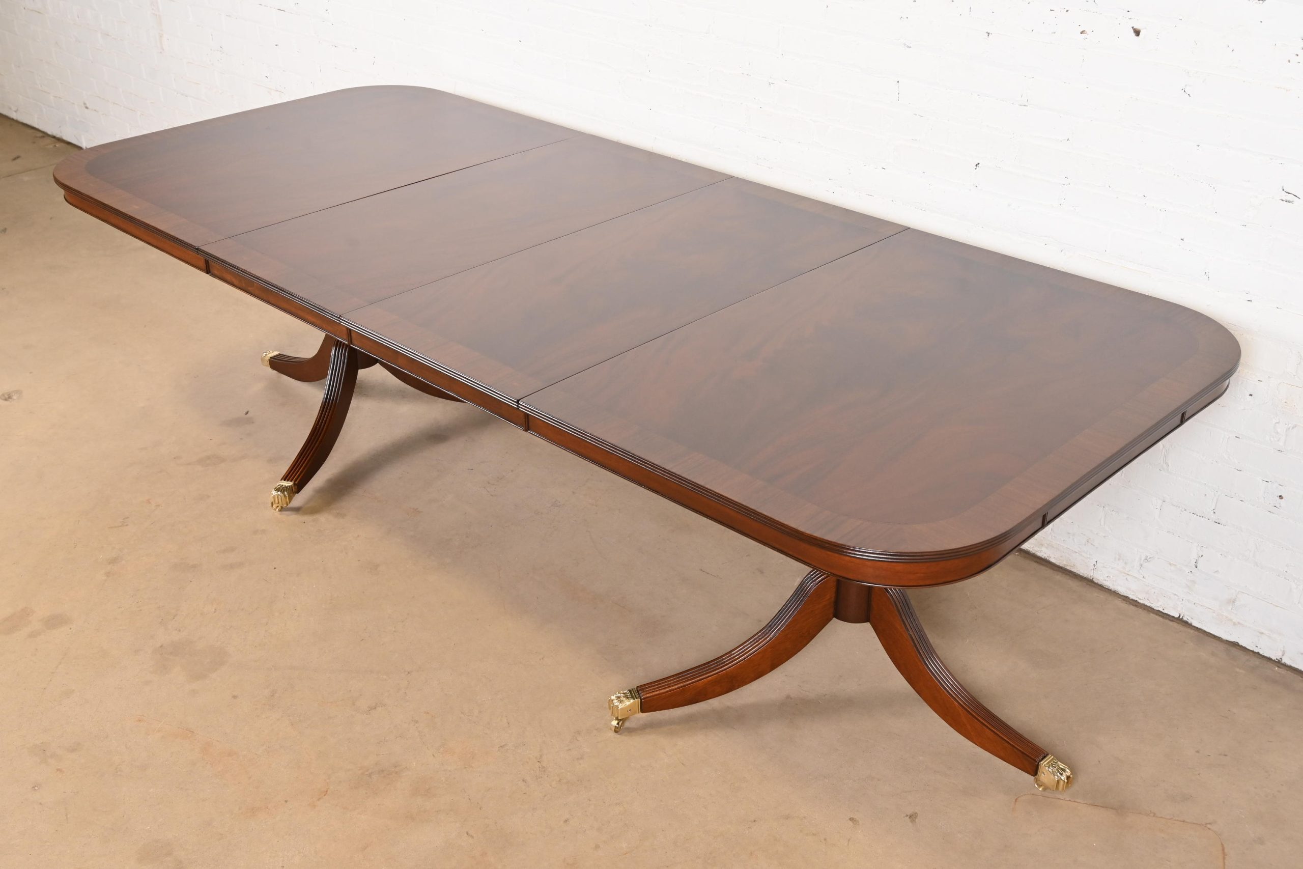 Baker Furniture Style Georgian Banded Flame Mahogany Double Pedestal Extension Dining Table, Newly Refinished