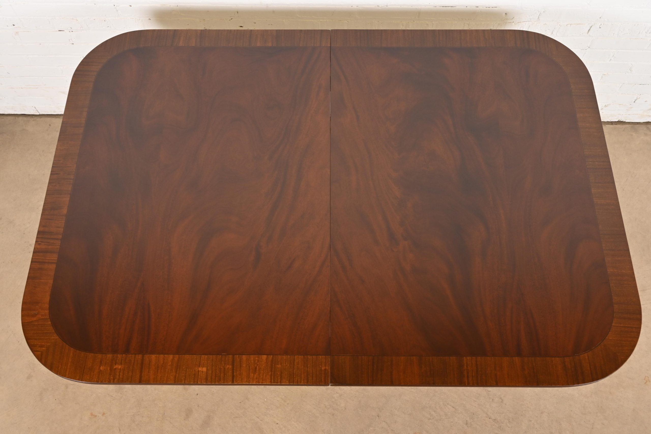Baker Furniture Style Georgian Banded Flame Mahogany Double Pedestal Extension Dining Table, Newly Refinished - Image 9