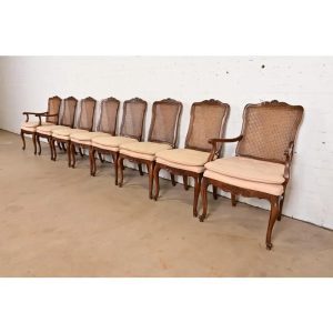 Baker Furniture Style French Provincial Louis XV Carved Walnut and Cane Back Dining Chairs, Set of Eight