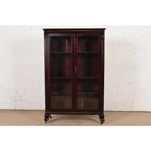 R. J. Horner Style American Empire Carved Mahogany Bookcase With Lion Heads, Circa 1890s