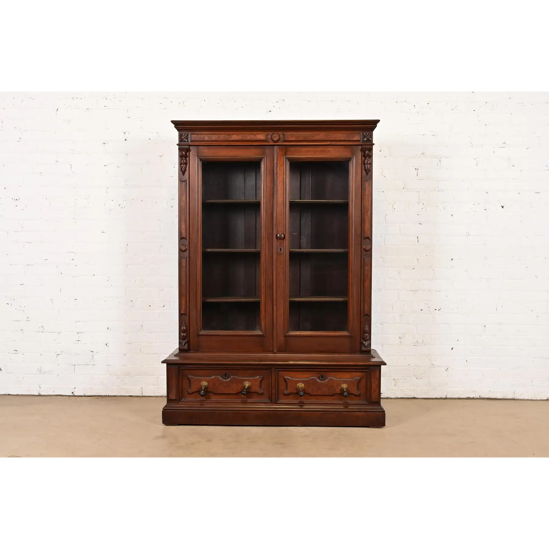 Herter Brothers Style Antique Eastlake Victorian Carved Walnut and Burl Wood Bookcase, Circa 1880s