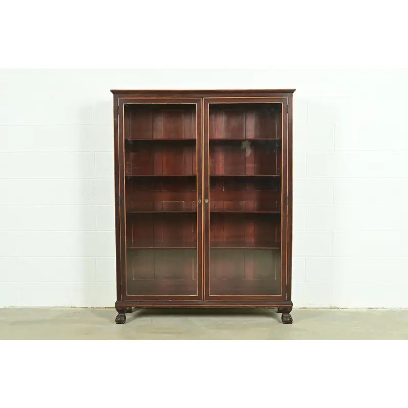 R. J. Horner Style American Empire Carved Mahogany Bookcase With Ball and Claw Feet, Circa 1890s