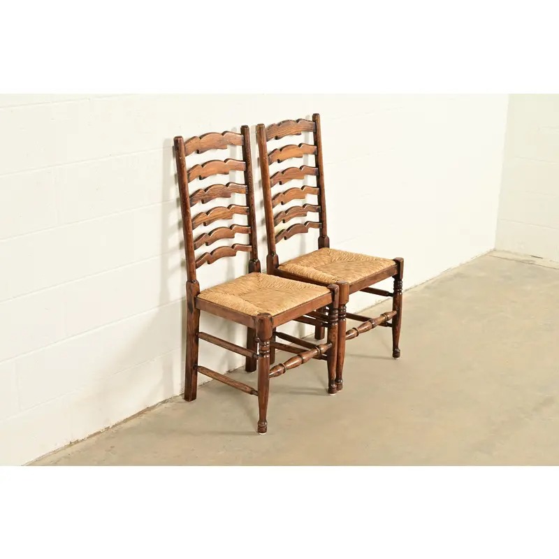 Baker Furniture Style English Country Rustic Carved Solid Oak Ladder Back Dining Chairs With Rush Seats, Pair - Image 3