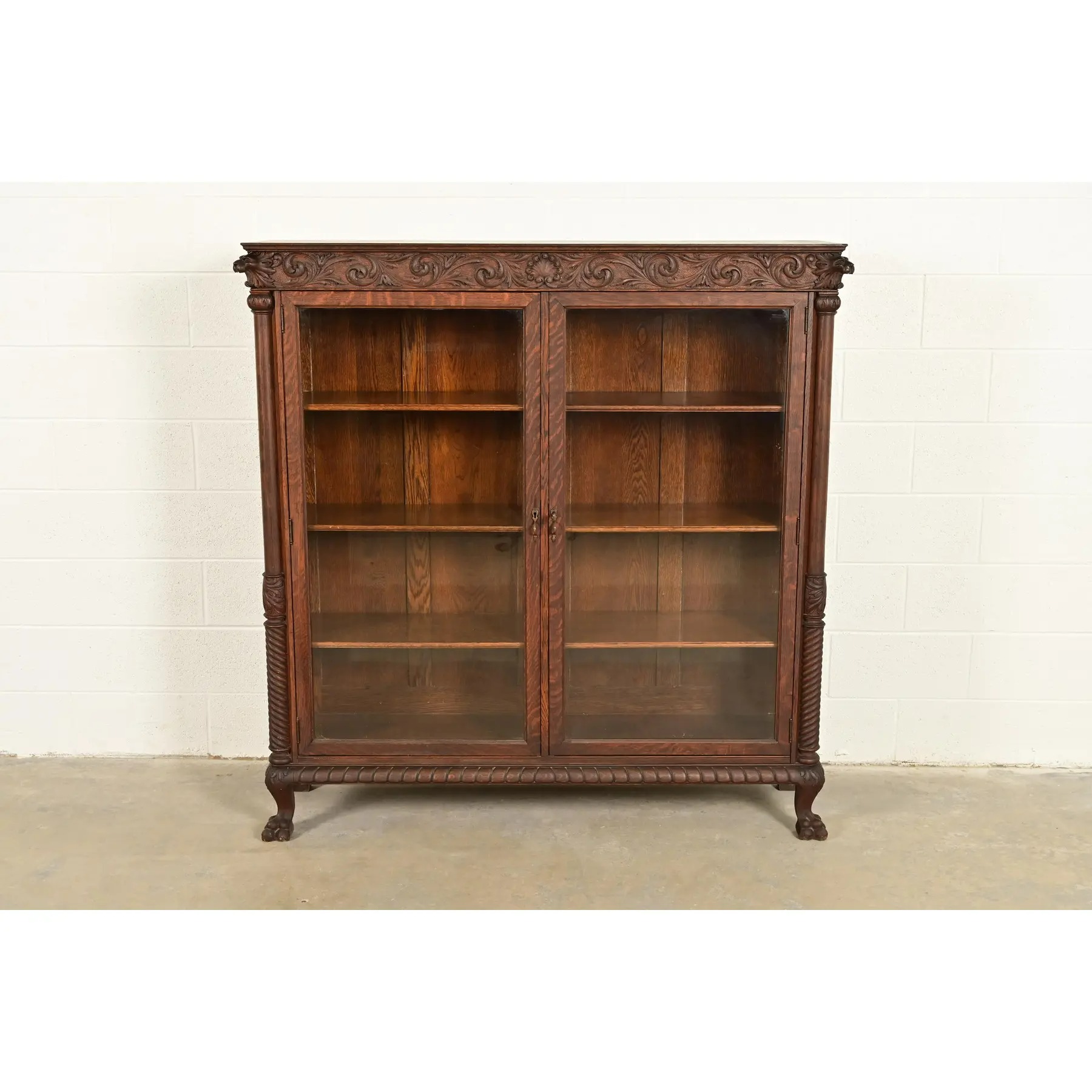 R. J. Horner Style Victorian Oak Double Bookcase With Carved Lion Heads and Paw Feet, Circa 1890s - Image 2