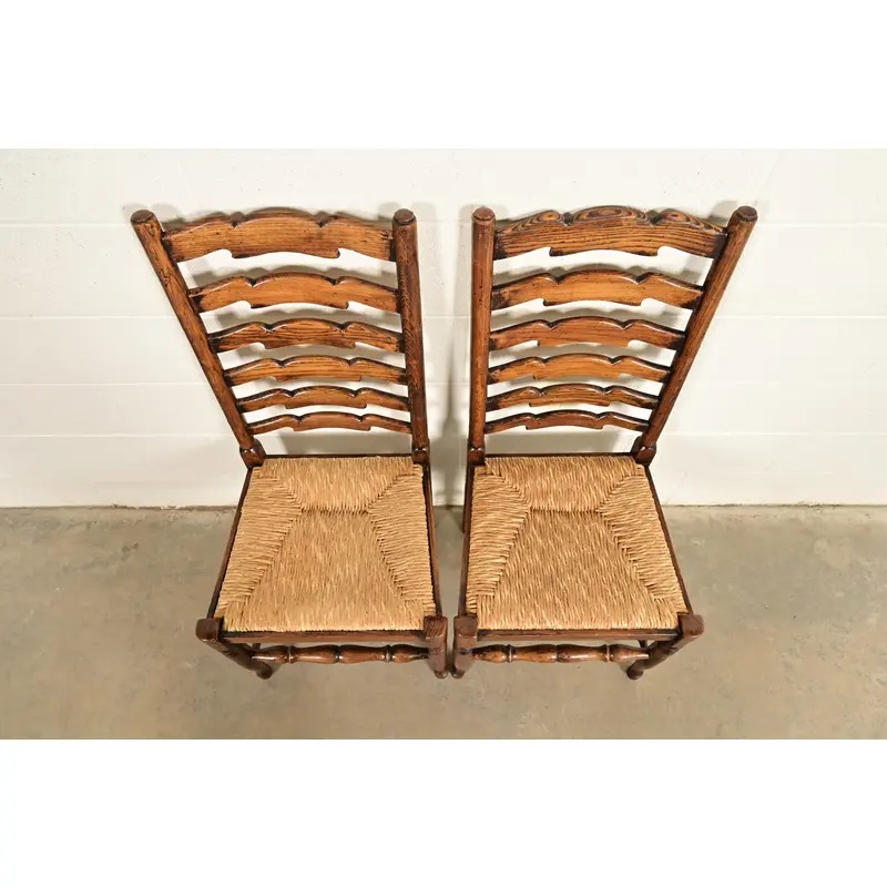 Baker Furniture Style English Country Rustic Carved Solid Oak Ladder Back Dining Chairs With Rush Seats, Pair - Image 5