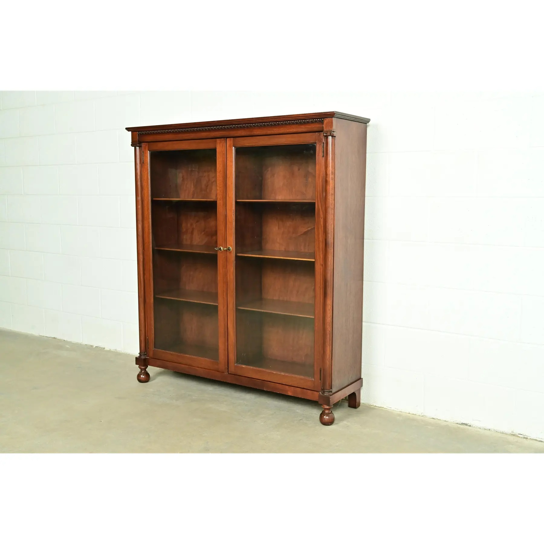 R. J. Horner Style Antique American Empire Carved Mahogany Glass Front Double Bookcase, Circa 1890s
