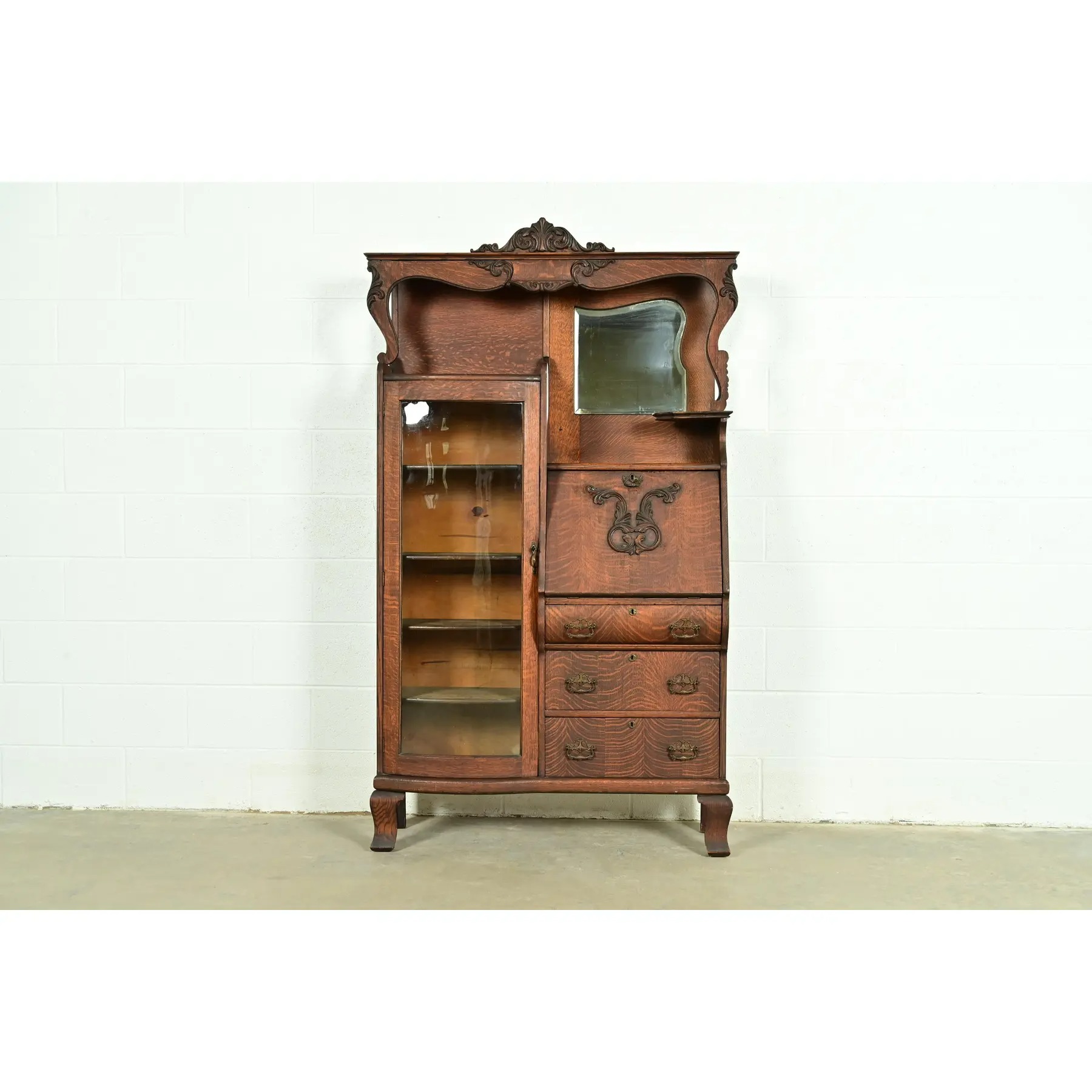 Early Baker Furniture Antique Victorian Carved Tiger Oak Side-by-Side Bookcase With Drop Front Secretary Desk, Circa 1900