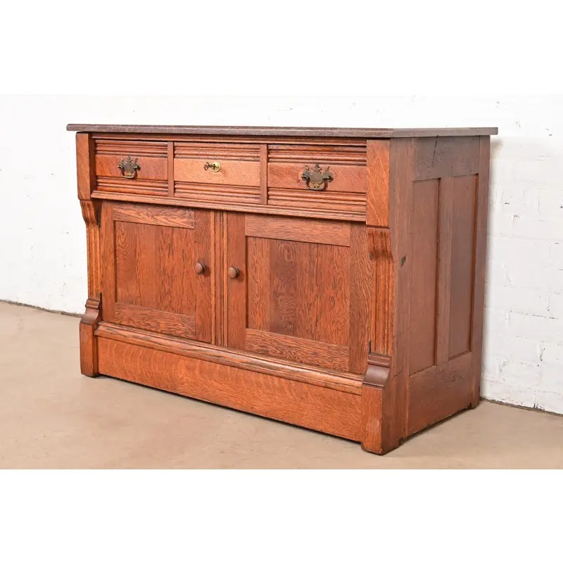 Antique Victorian Carved Oak Marble Top Sideboard Buffet or Bar Cabinet, Circa 1890s