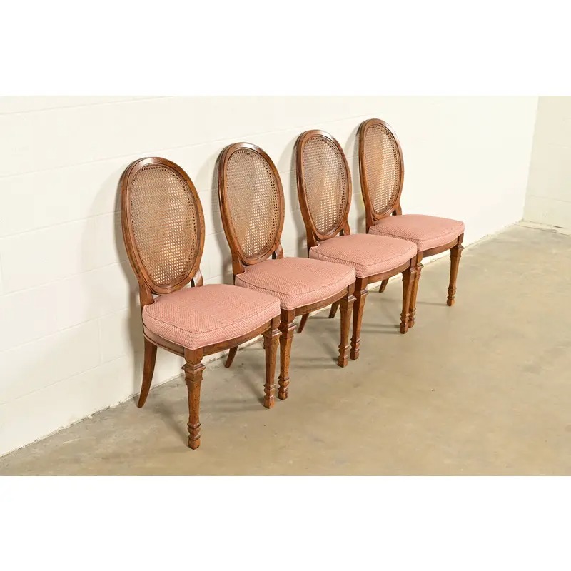 Drexel French Regency Louis XVI Carved Walnut Cane Back Dining Chairs | Set of Four