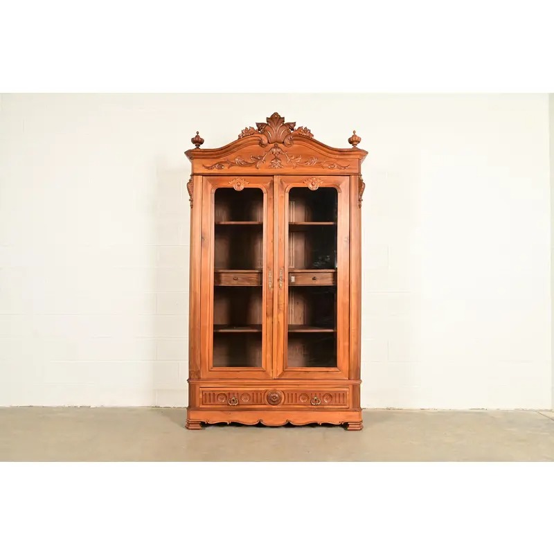 R. J. Horner Style Antique Victorian Carved Walnut Bookcase Cabinet, Circa 1880s