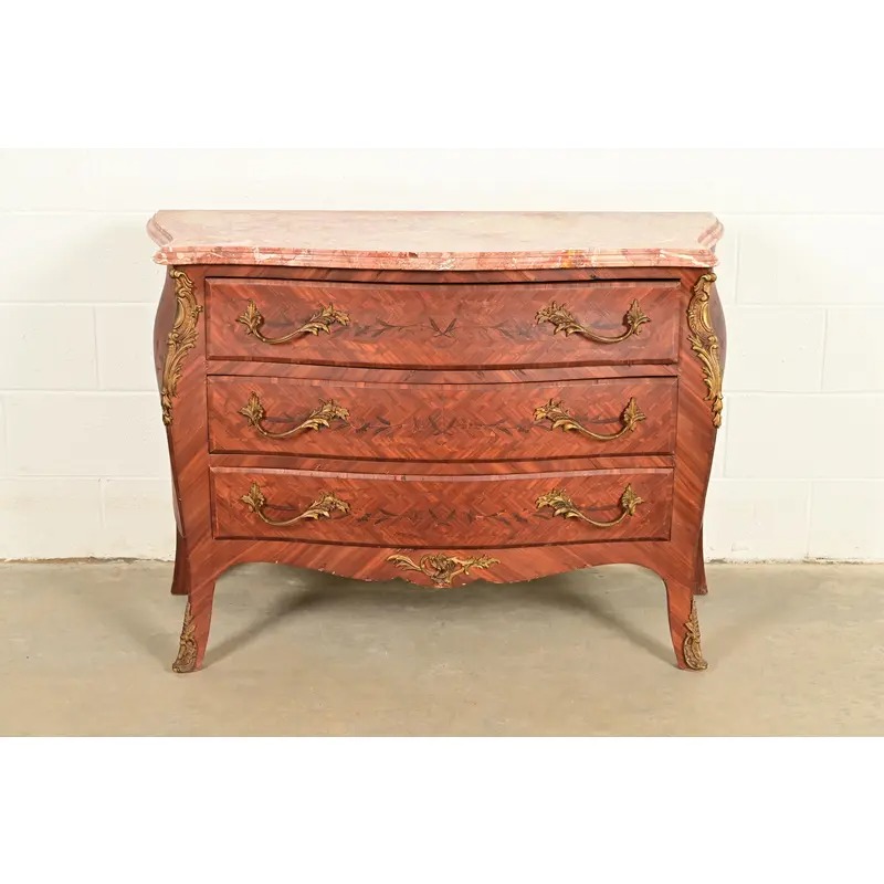 Paul Sormani Style Antique French Provincial Louis XV Kingwood Inlaid Marquetry Marble Top Commode With Mounted Ormolu | Circa 1920s