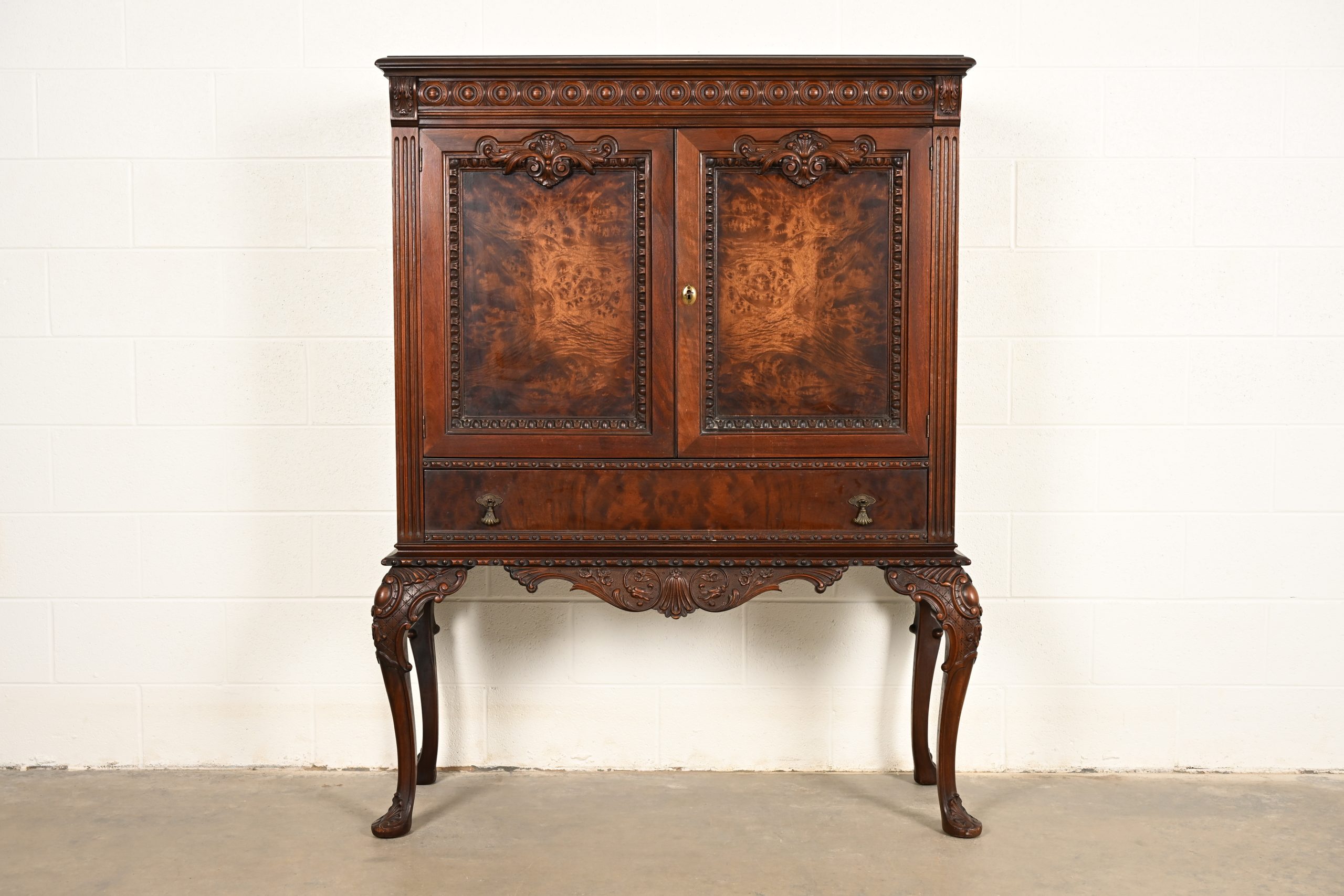 Berkey & Gay Style Antique Chippendale Carved Walnut and Burl Wood Bookcase or Bar Cabinet, Circa 1920s