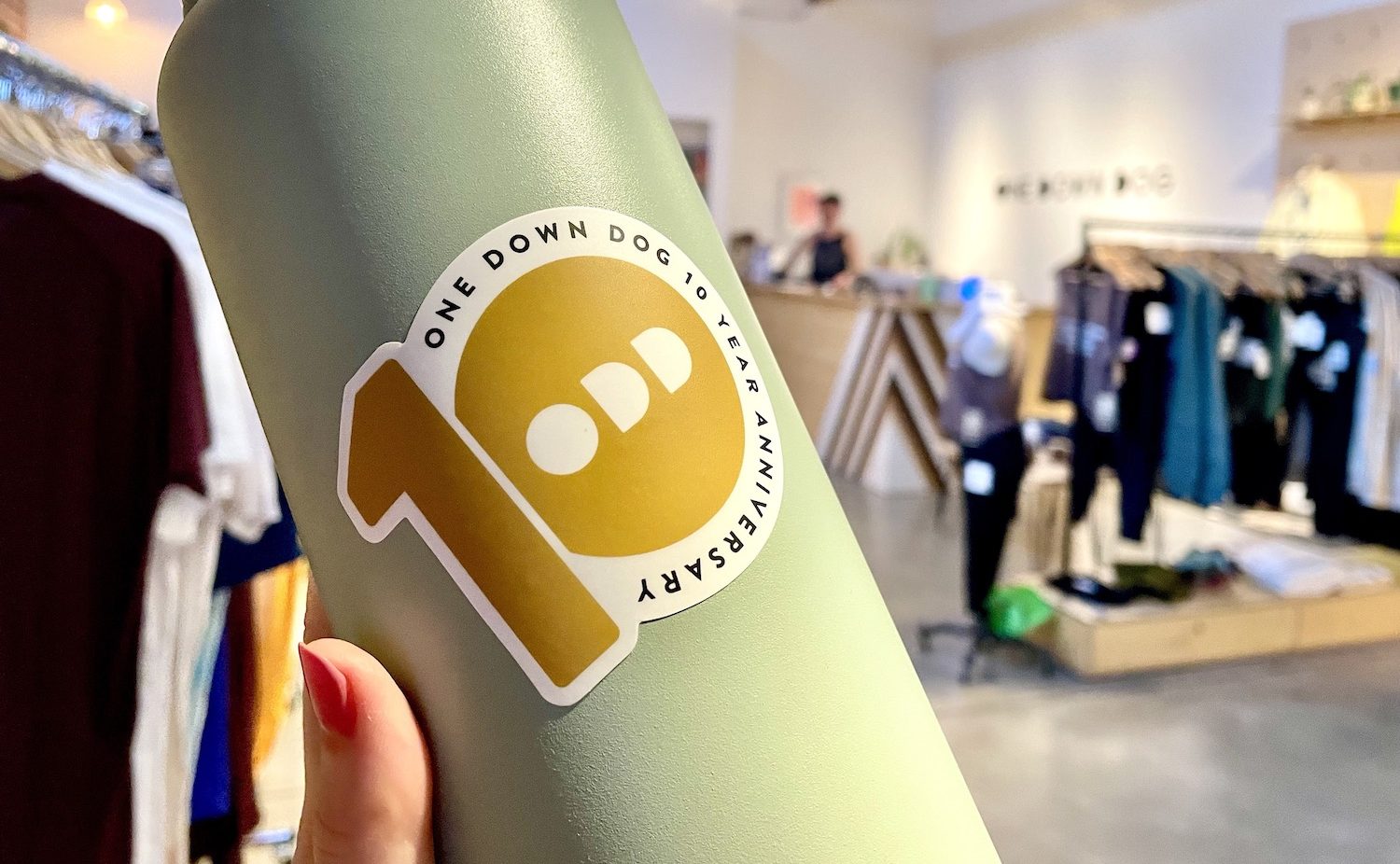 sticker on water bottle: One Down Dog 10 year anniversary celebrating One Down Dog yoga studio with locations in East Hollywood, Echo Park and Eagle Rock