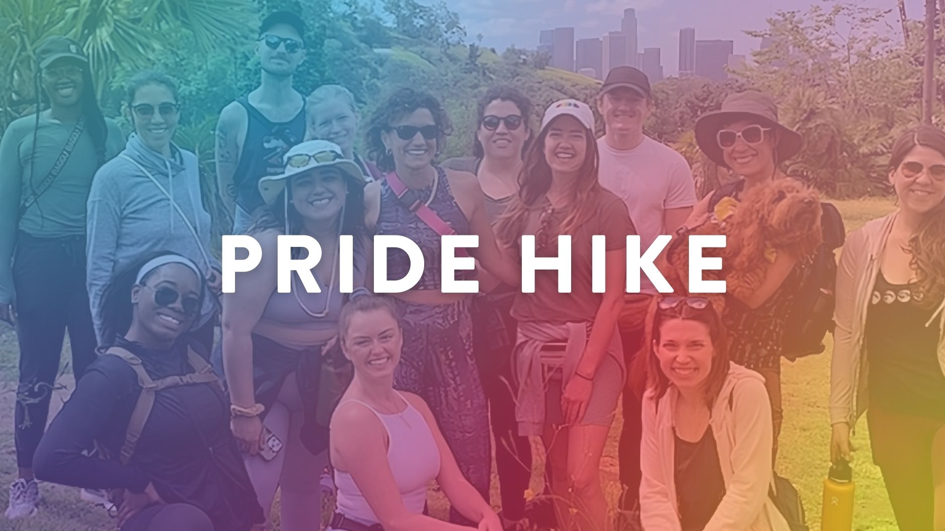 Graphic: words pride hike overlaid on image of yoga students hiking in Los Angeles