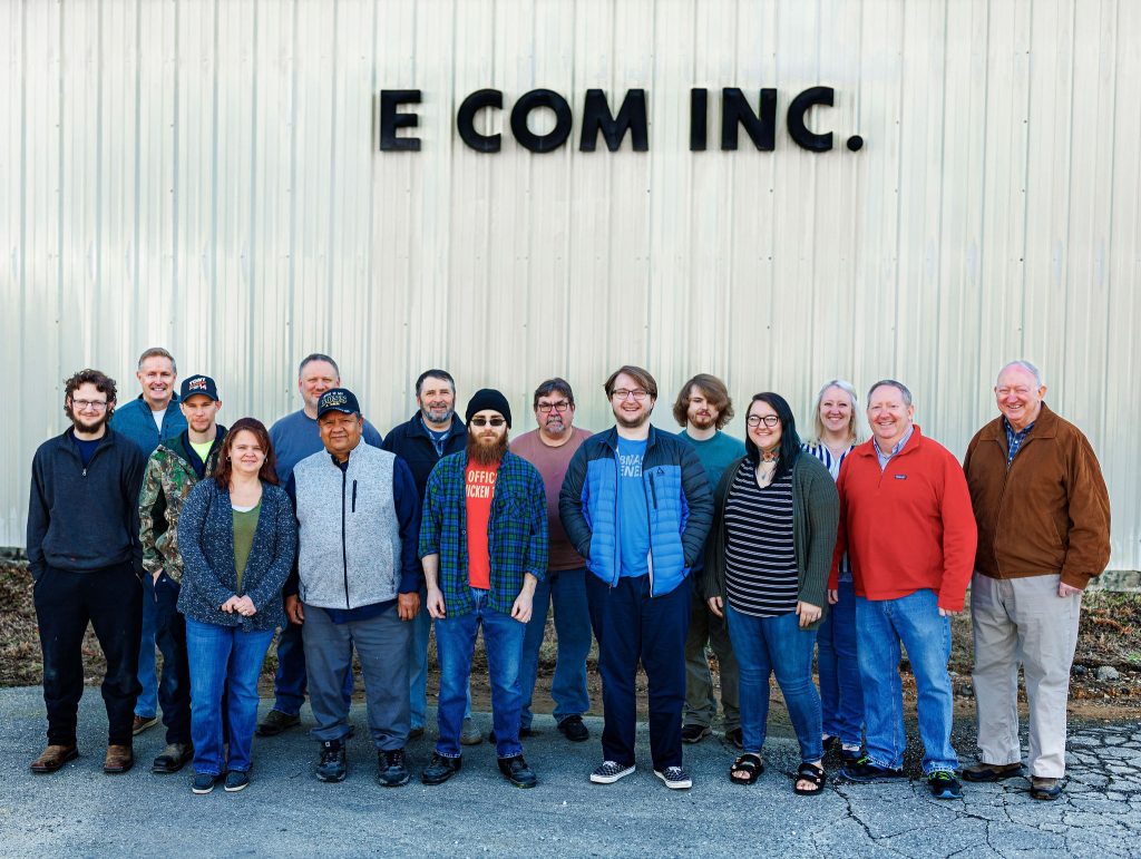 E Com Seating team standing outside their Cookeville, Tennessee facility, the family-owned manufacturer behind American-made industrial and laboratory seating