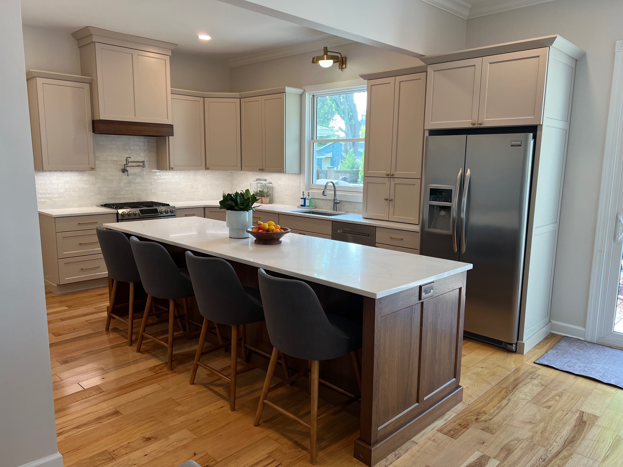 renovated kitchen with custom cabinets and oversized island