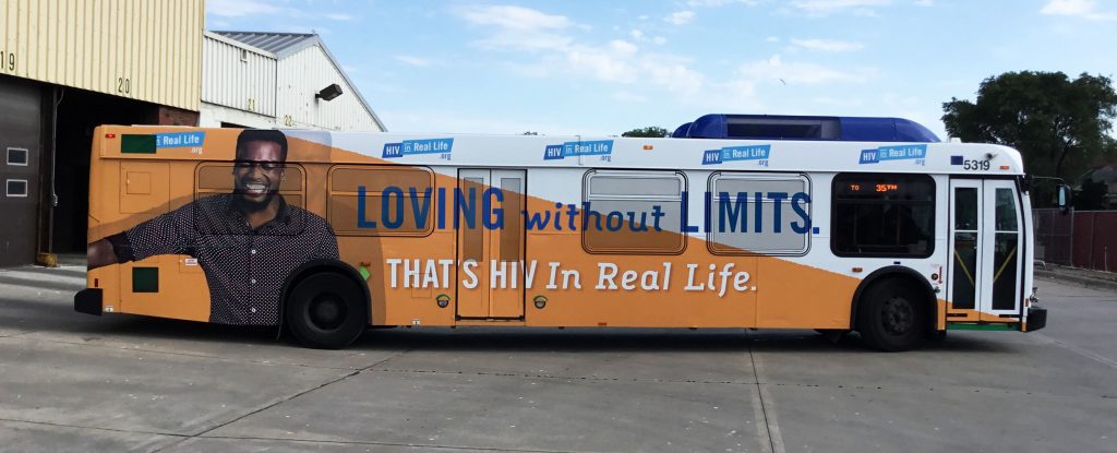 A bus with the HIV campaign's slogan on the side
