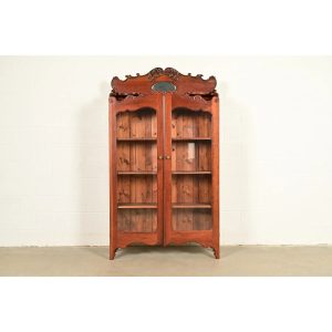 Antique Victorian Carved Cherry Wood Two-Door Bookcase Cabinet, Circa 1880s