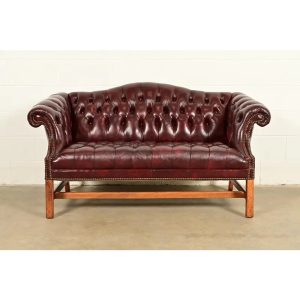 Hancock and Moore Style Vintage Chippendale Tufted Oxblood Leather Camelback Chesterfield Sofa, Circa 1980s