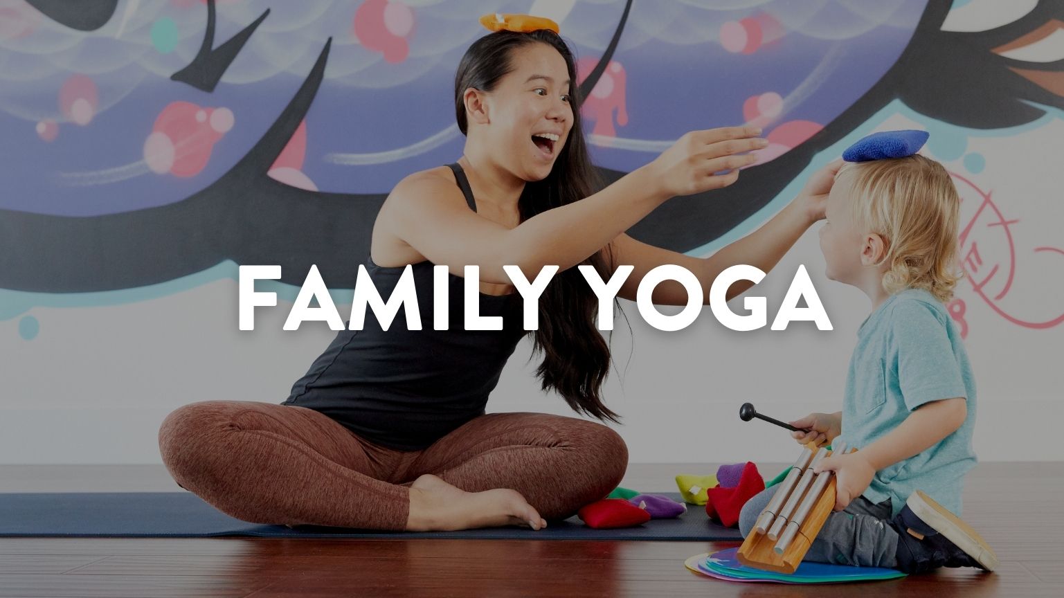 mom and child doing family yoga class in Los Angeles