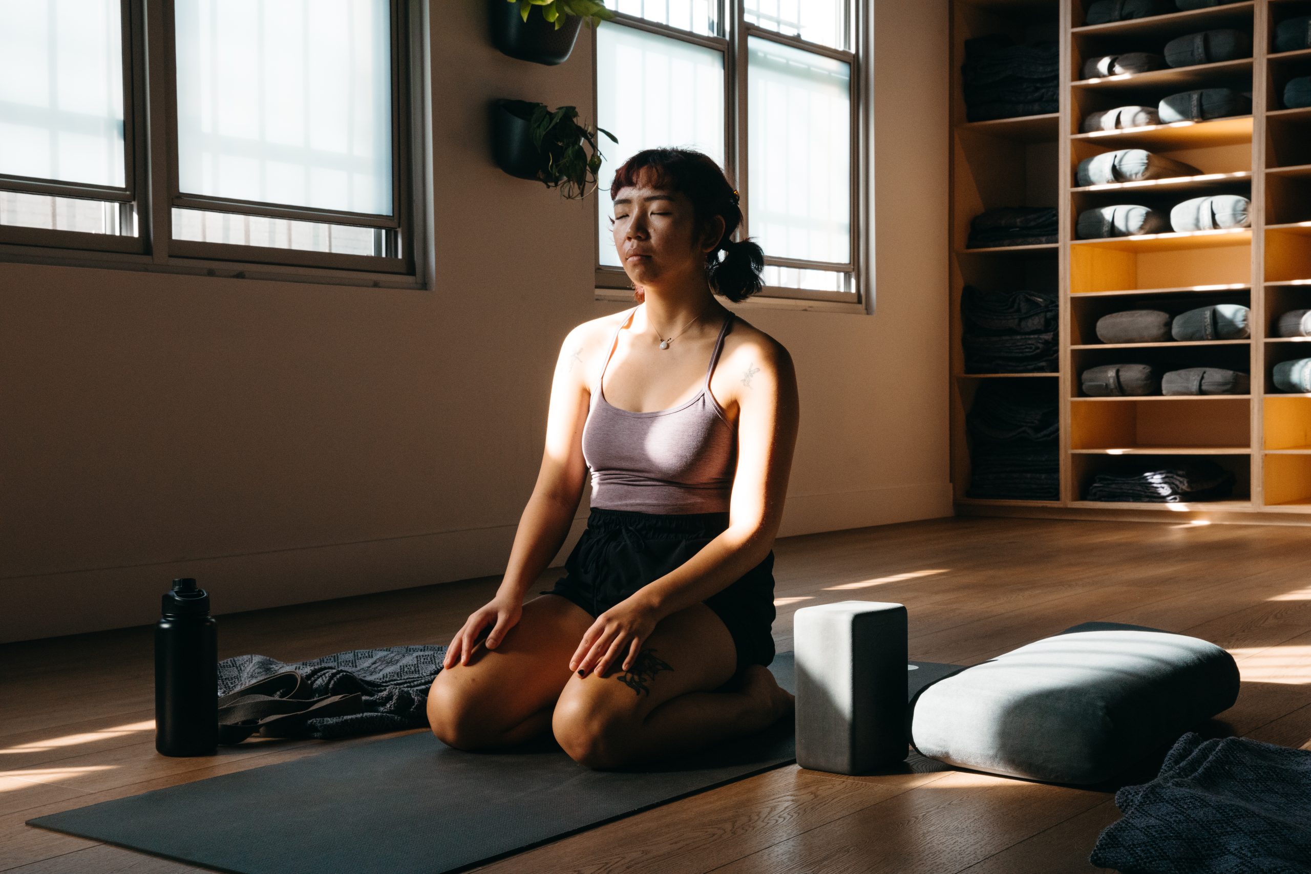 person meditating in mindfulness training with Sam Akers at Eagle Rock yoga studio
