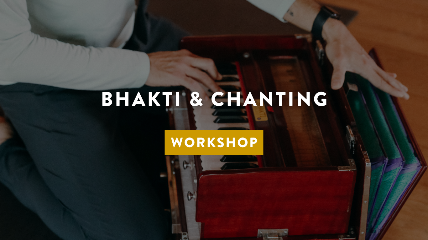 Bhakti yoga teacher playing the harmonium with text Bhakti & chanting workshop