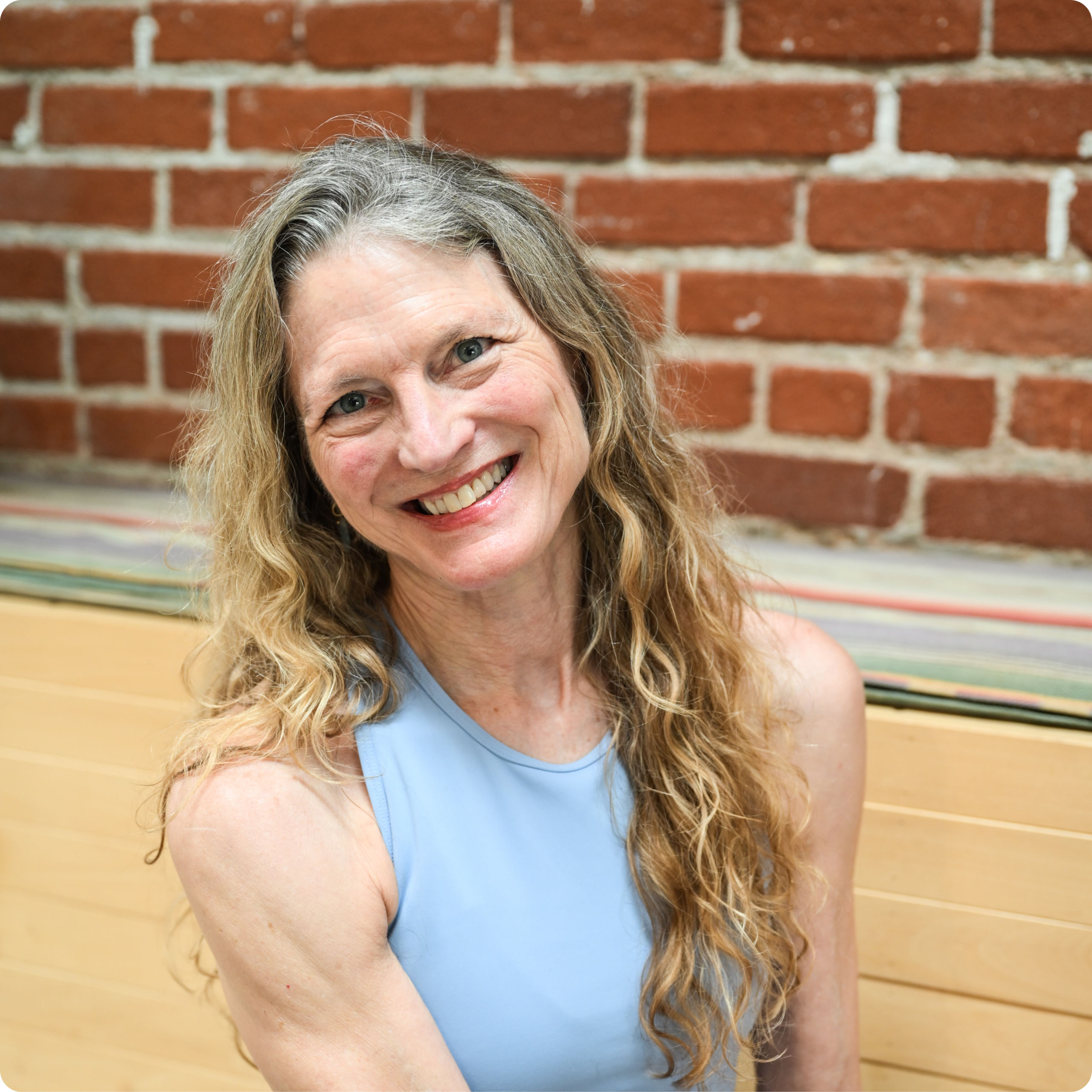 Image of One Down Dog yoga and fitness instructor Deborah Lee posing at the los angeles studio in Echo Park